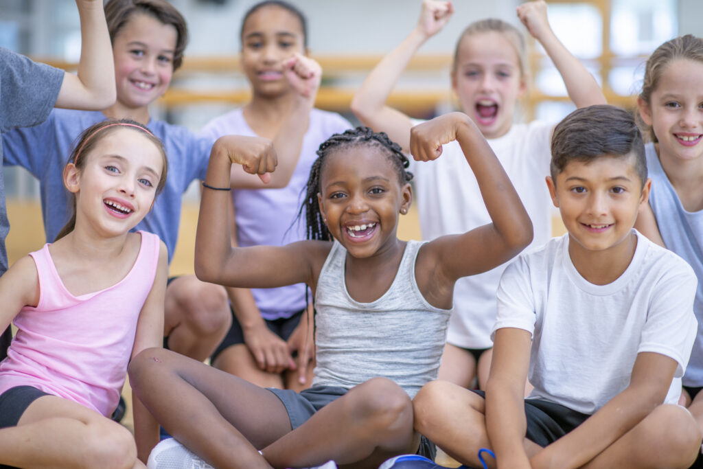 Group of kids showing their school spirit together.